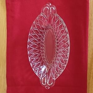 PRETZEL PATTERN CLEAR INDIANA GLASS. USED AS A CELERY OR PICKLE DISH.